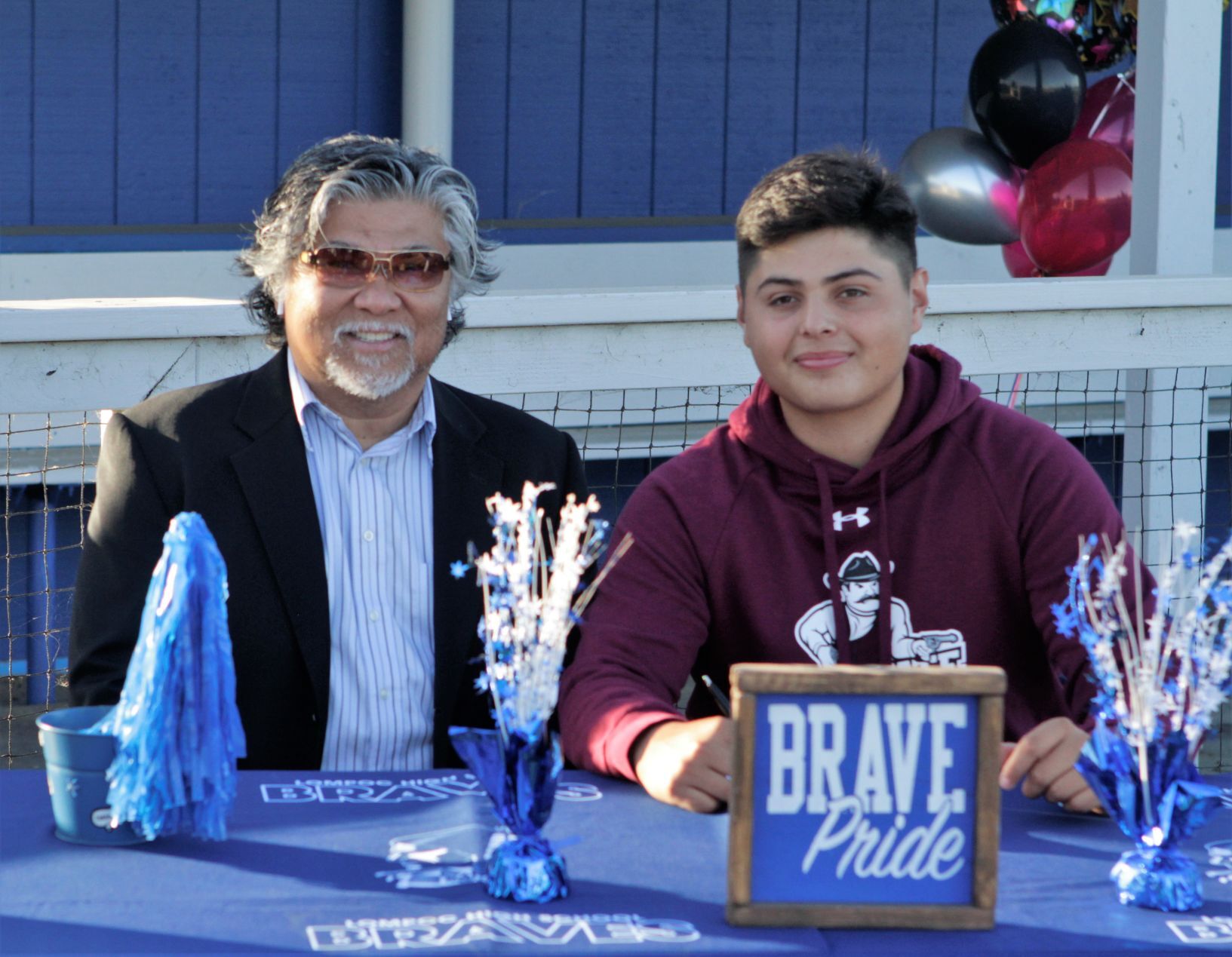 111220 Espinoza signs 24.JPG